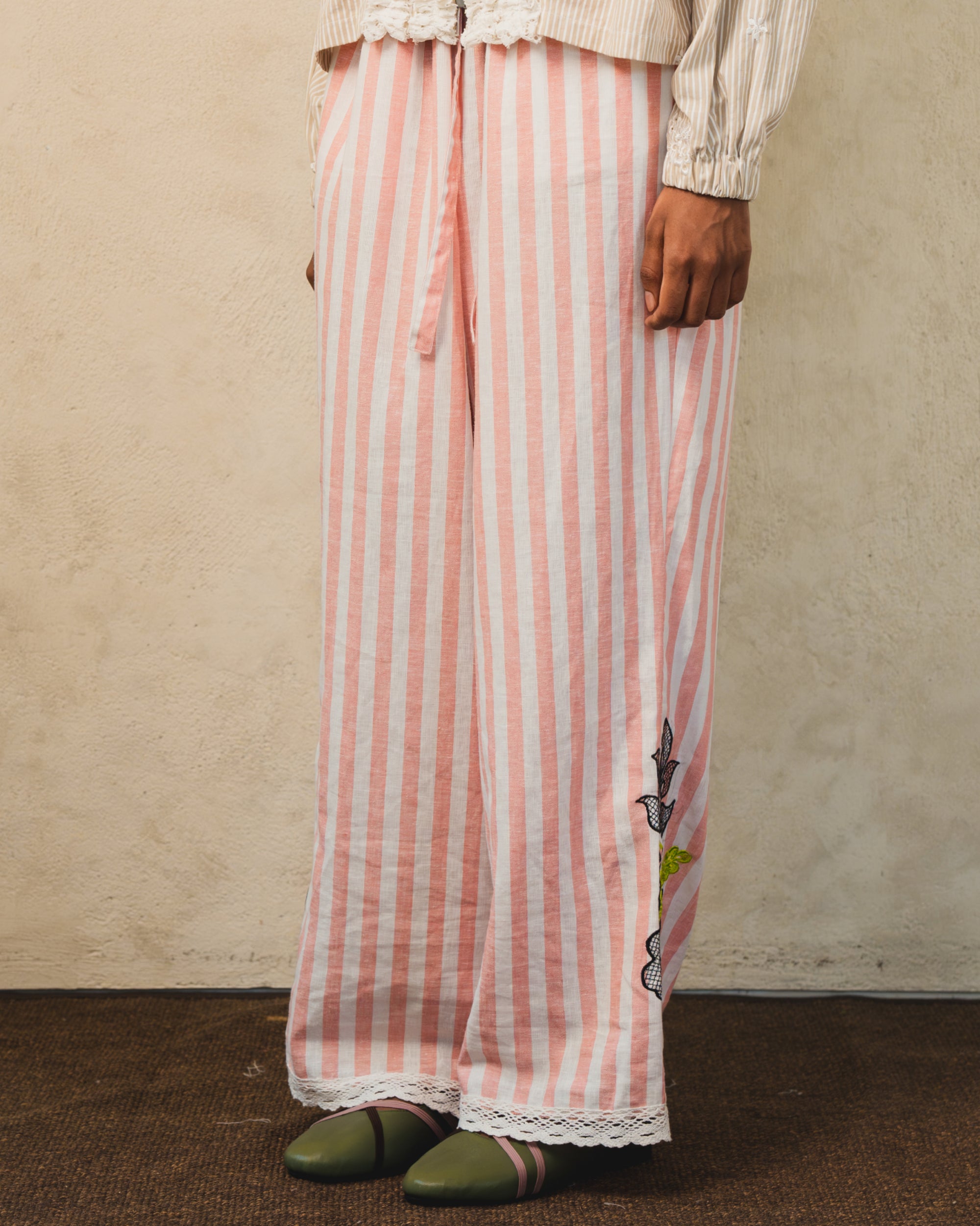 Image of Pino Embroidery Pants Stripes, wide-leg linen pants with adjustable drawstring waist.