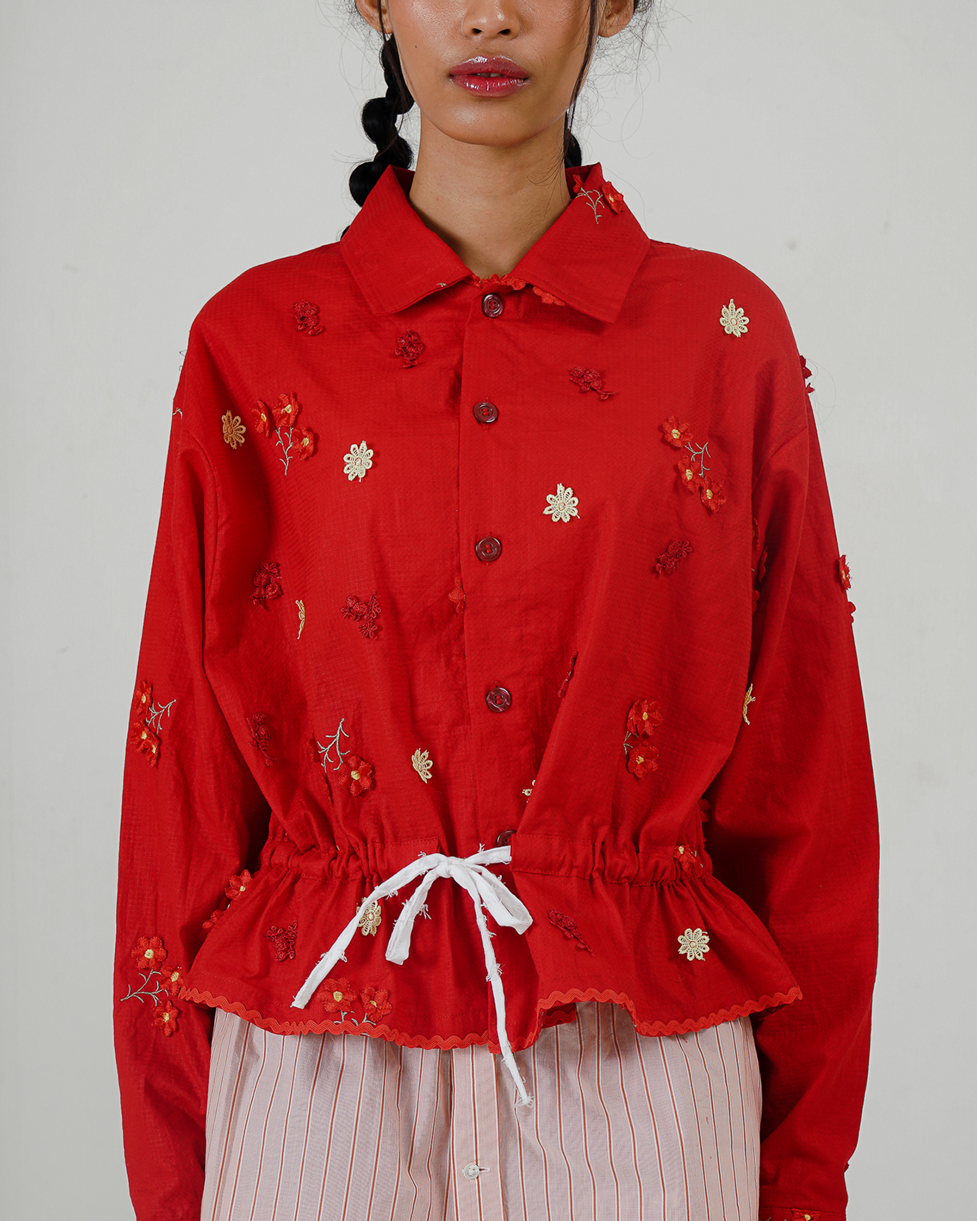 Image of Rahayu Embroidery Jacket, a linen jacket featuring a floral embroidery and tie details at the waist.