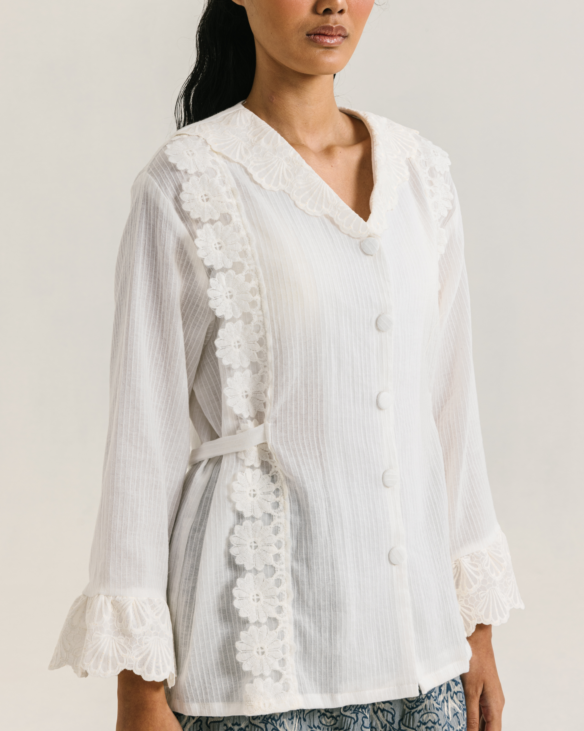 Image of Ramona Longsleeve White, a vintage-inspired blouse made from comfortable cotton with an added charming lace details on it. 