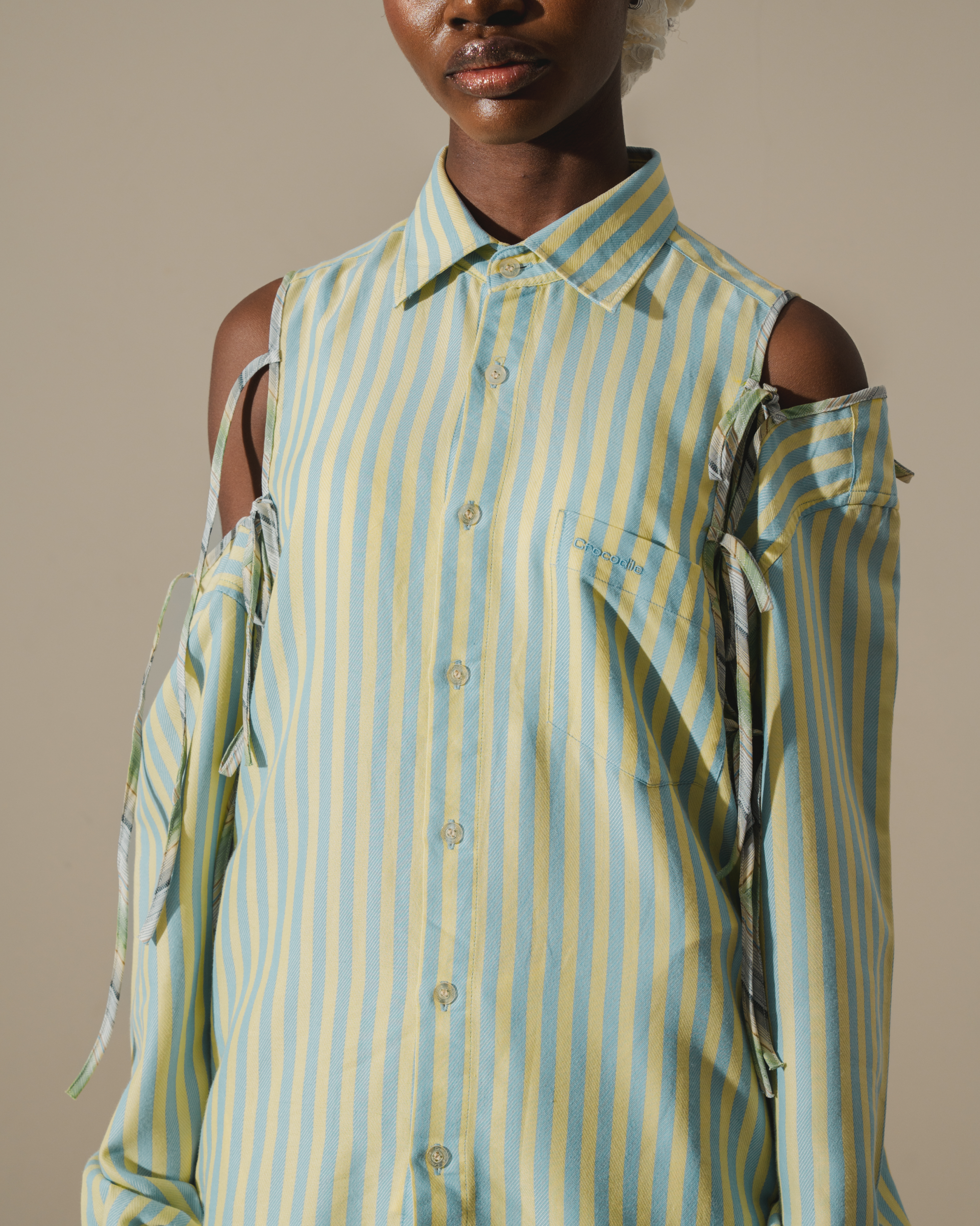 Image of RE-WORK 00 SHIRT, a shirt with cutout and ribbon detailing on the shoulders part.