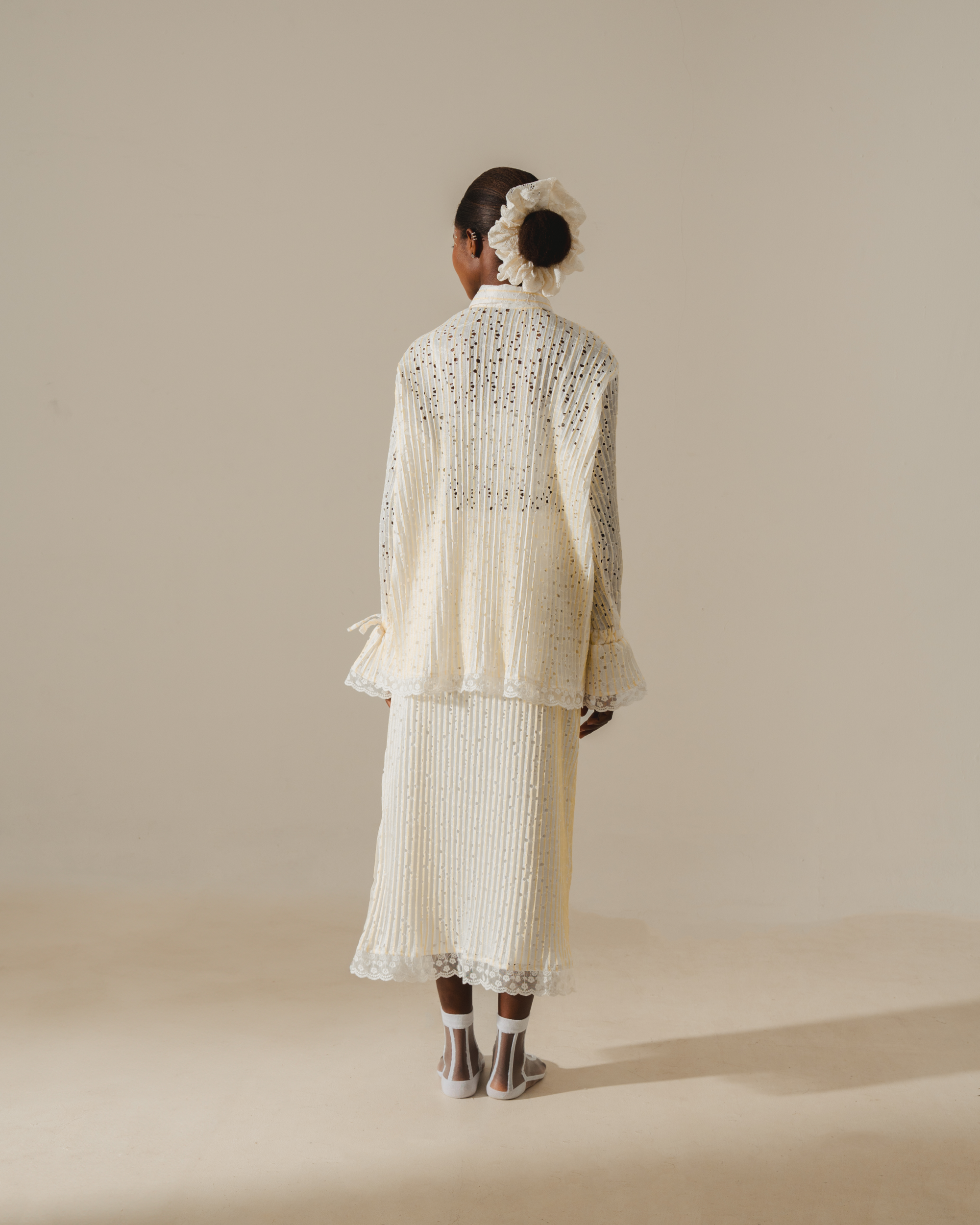 Image of Saia Lace Blouse, a longsleeve shirt made from pleated cotton crepe.