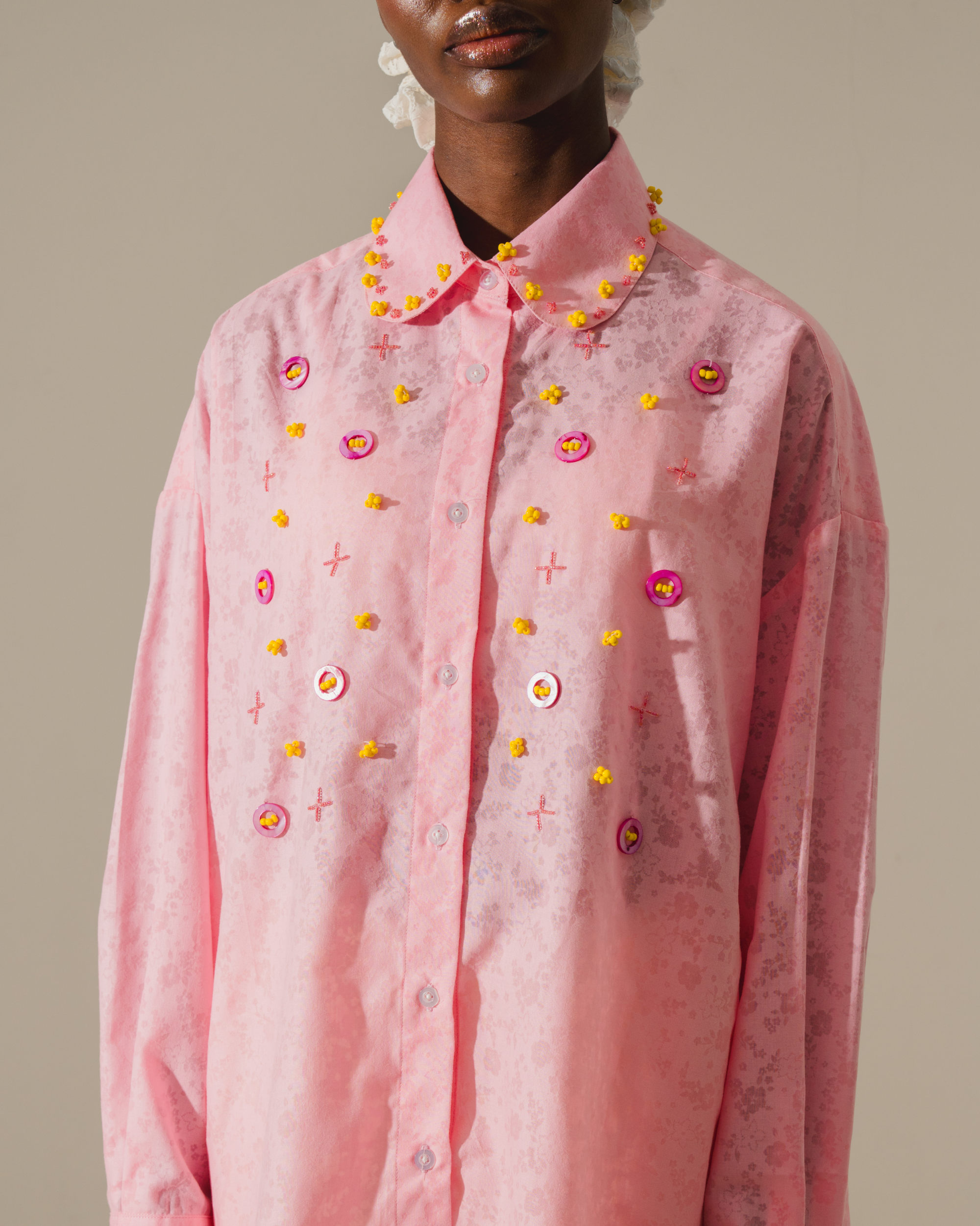 Image of Starr Shirt Pink, a longsleeve shirt made from cotton, hand-embroidered with beads.