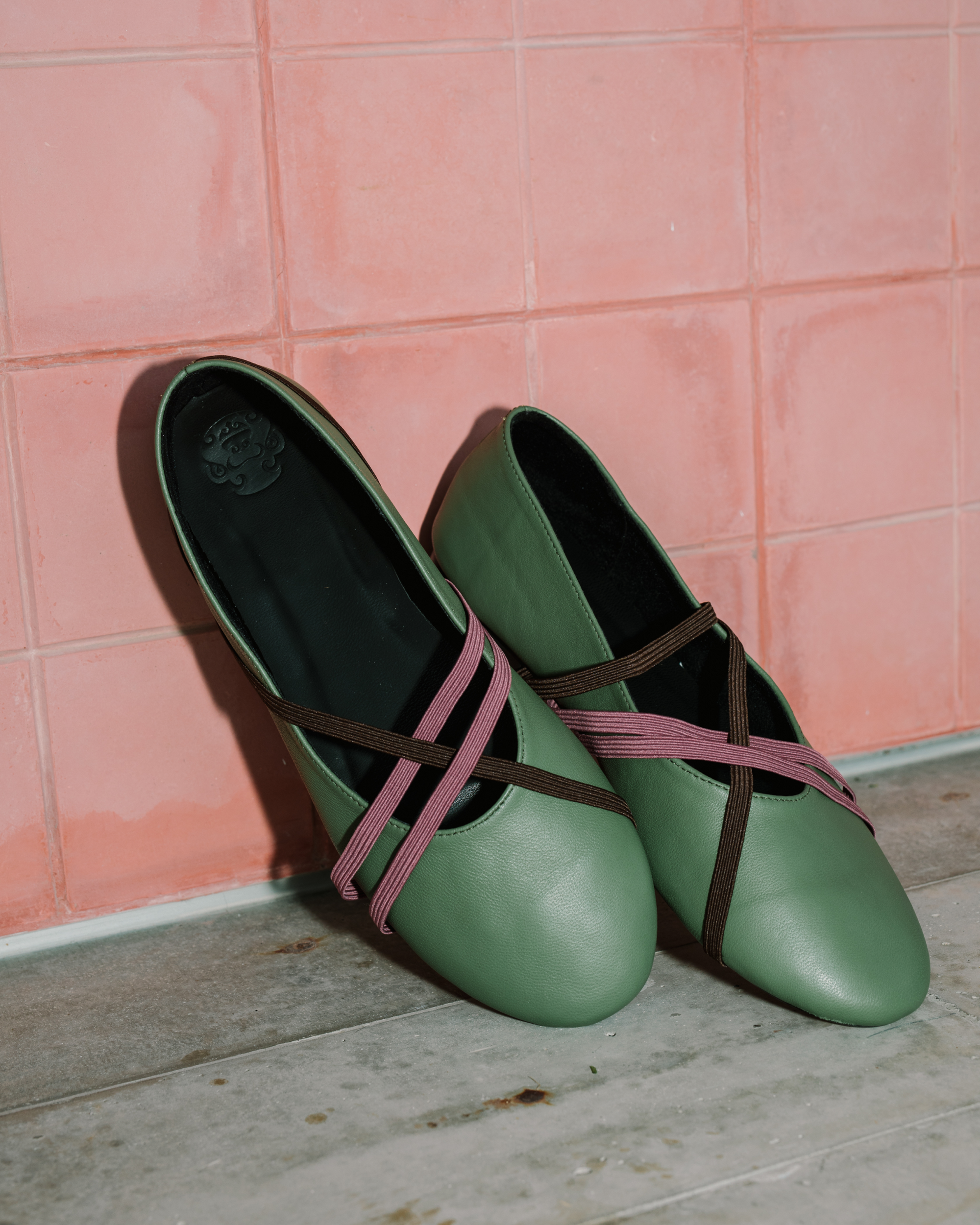 Image of Strappy Ballerina Green, a ballet flat shoes made from genuine leather with a criss-cross elastic bands.