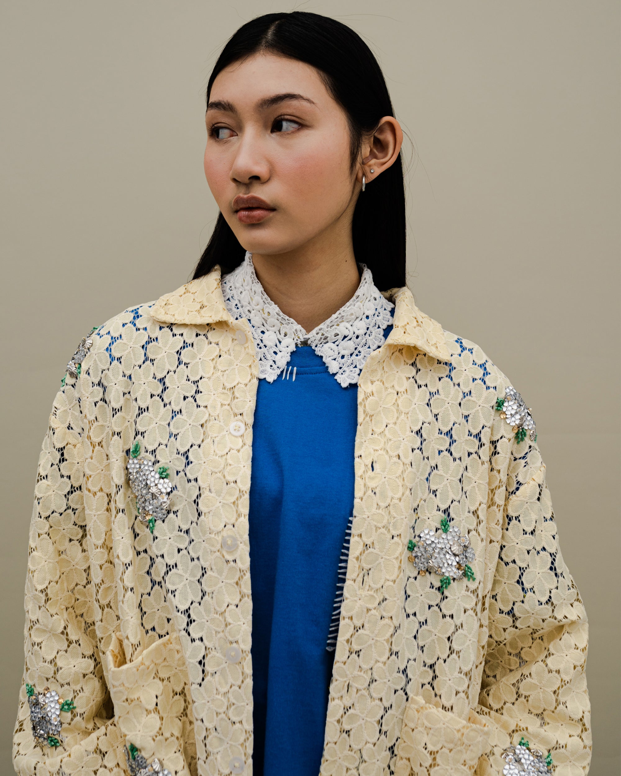 Image of Tali Beaded Shirt-Jacket Yellow, a shirt-jacket adorned with silver beadwork.