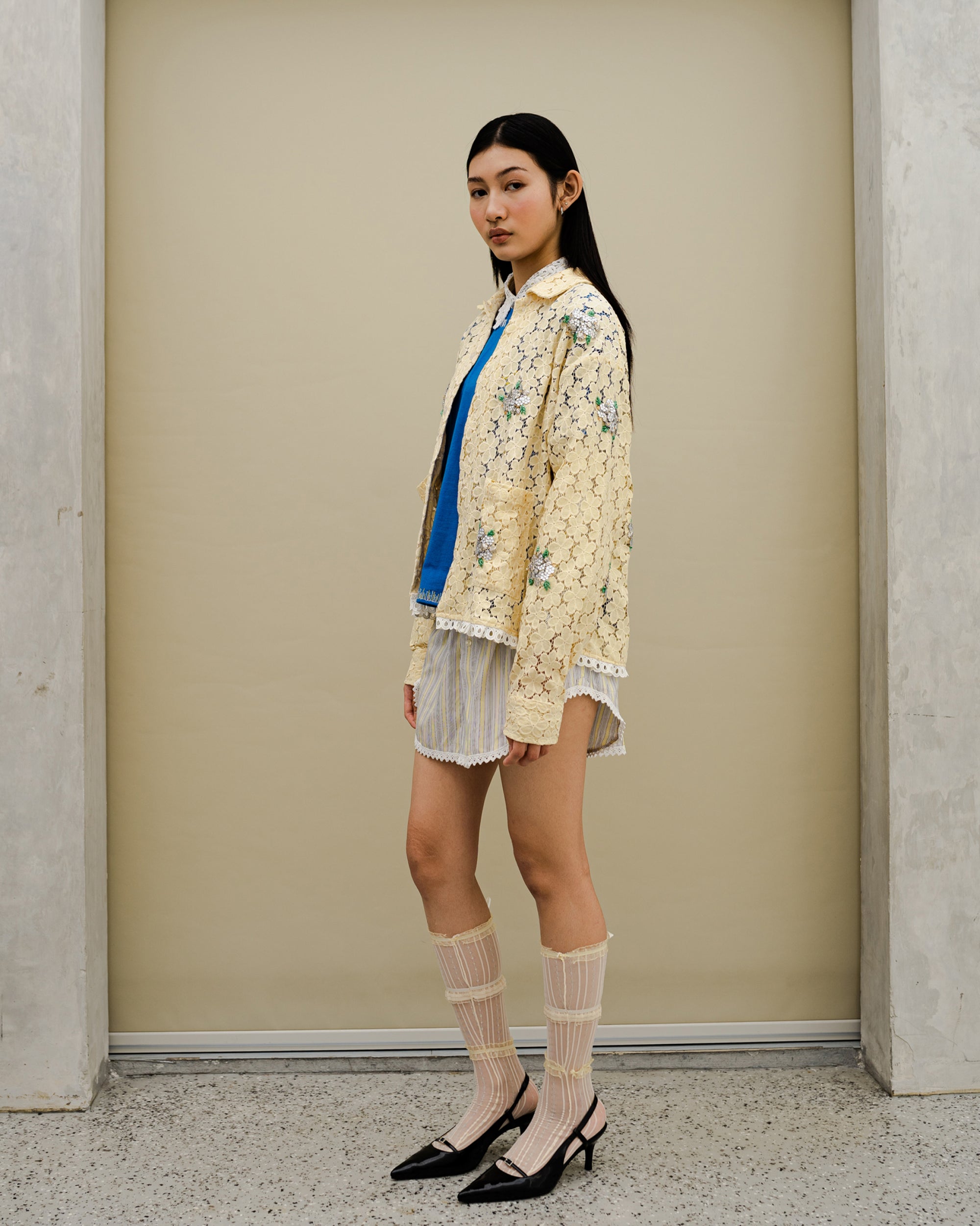 Image of Tali Beaded Shirt-Jacket Yellow, a shirt-jacket adorned with silver beadwork.