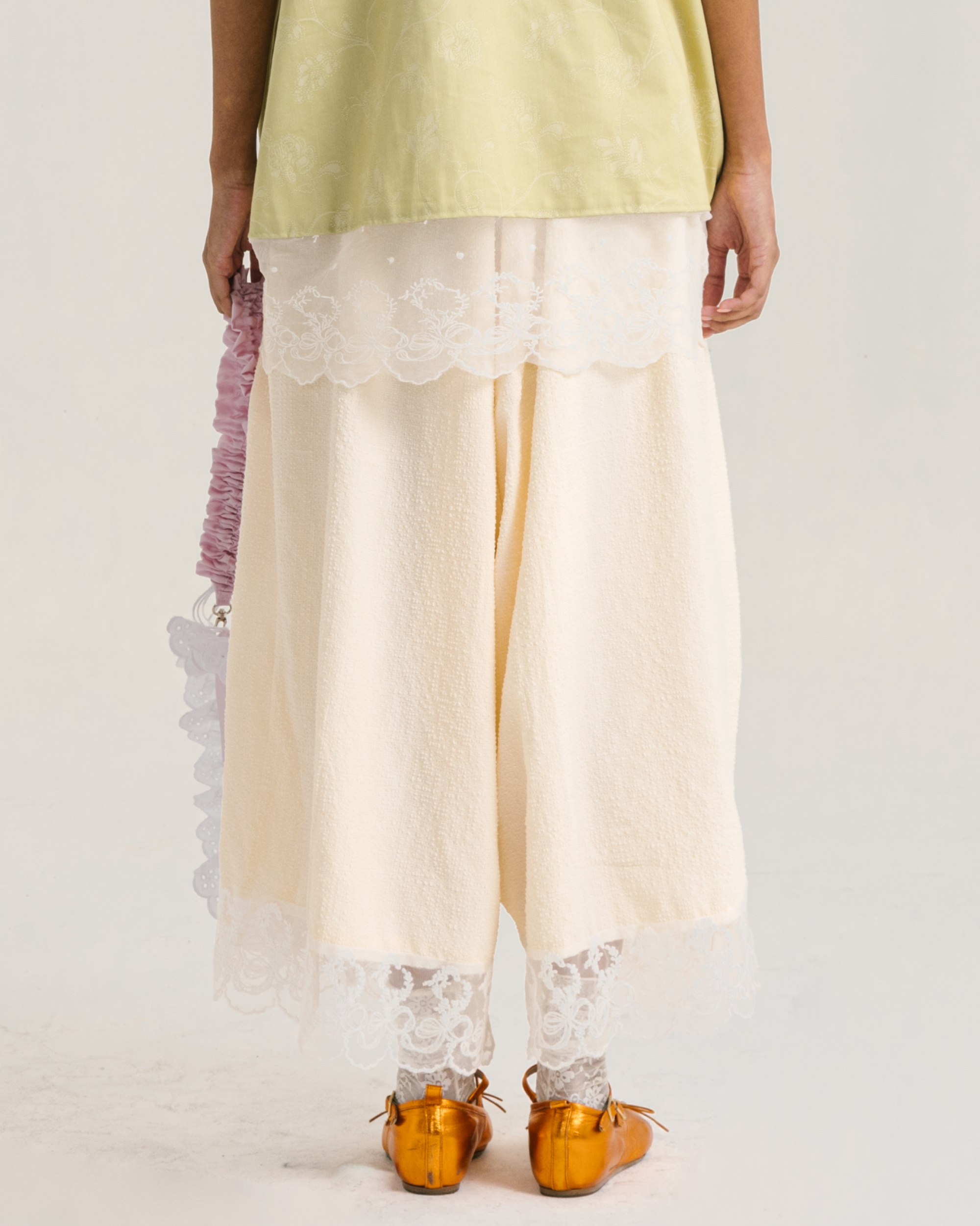 Image of Wisteria Pants Creme, a relaxed wide-leg pants made from cotton with a balloon-like sillhouette. 