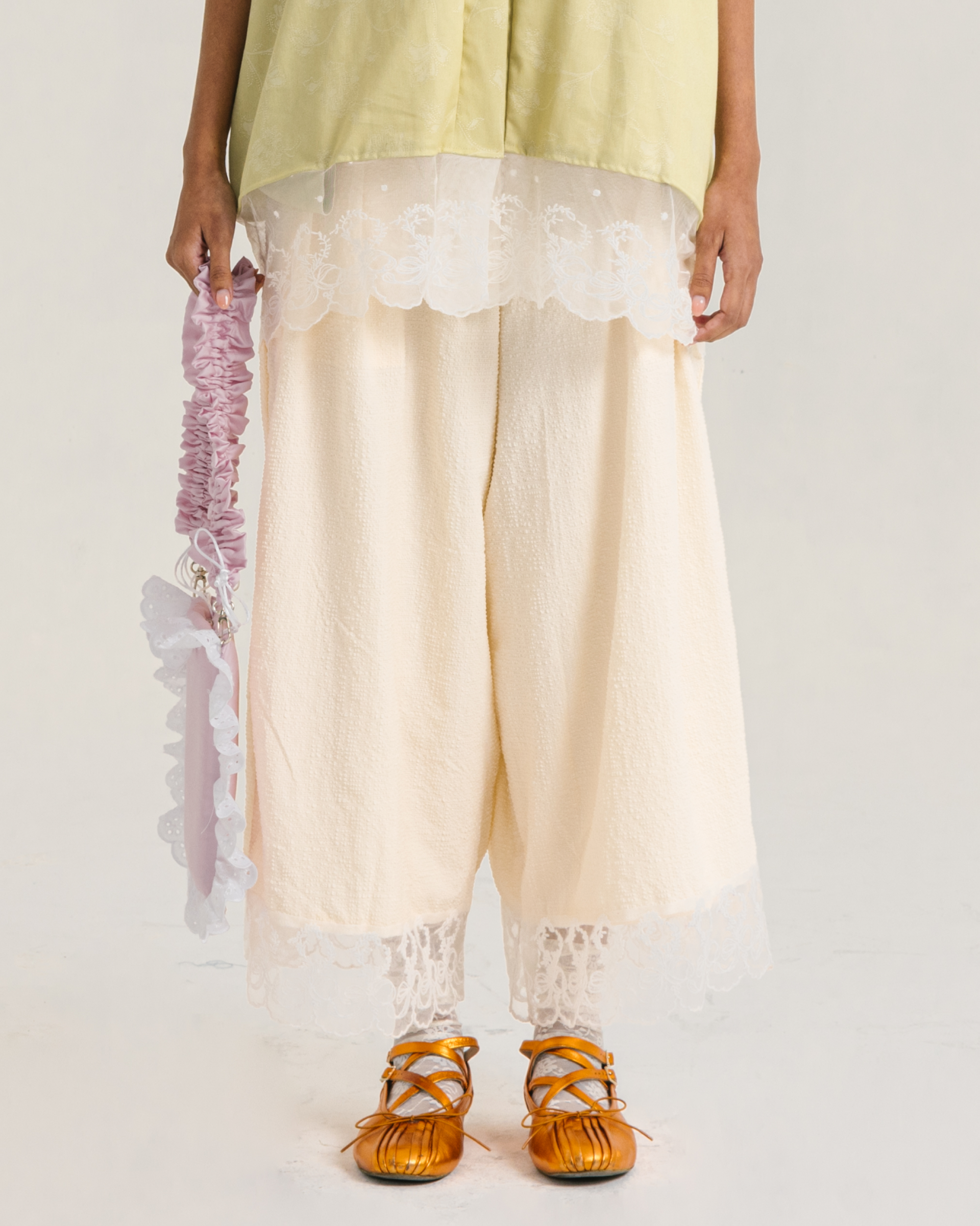 Image of Wisteria Pants Creme, a relaxed wide-leg pants made from cotton with a balloon-like sillhouette. 