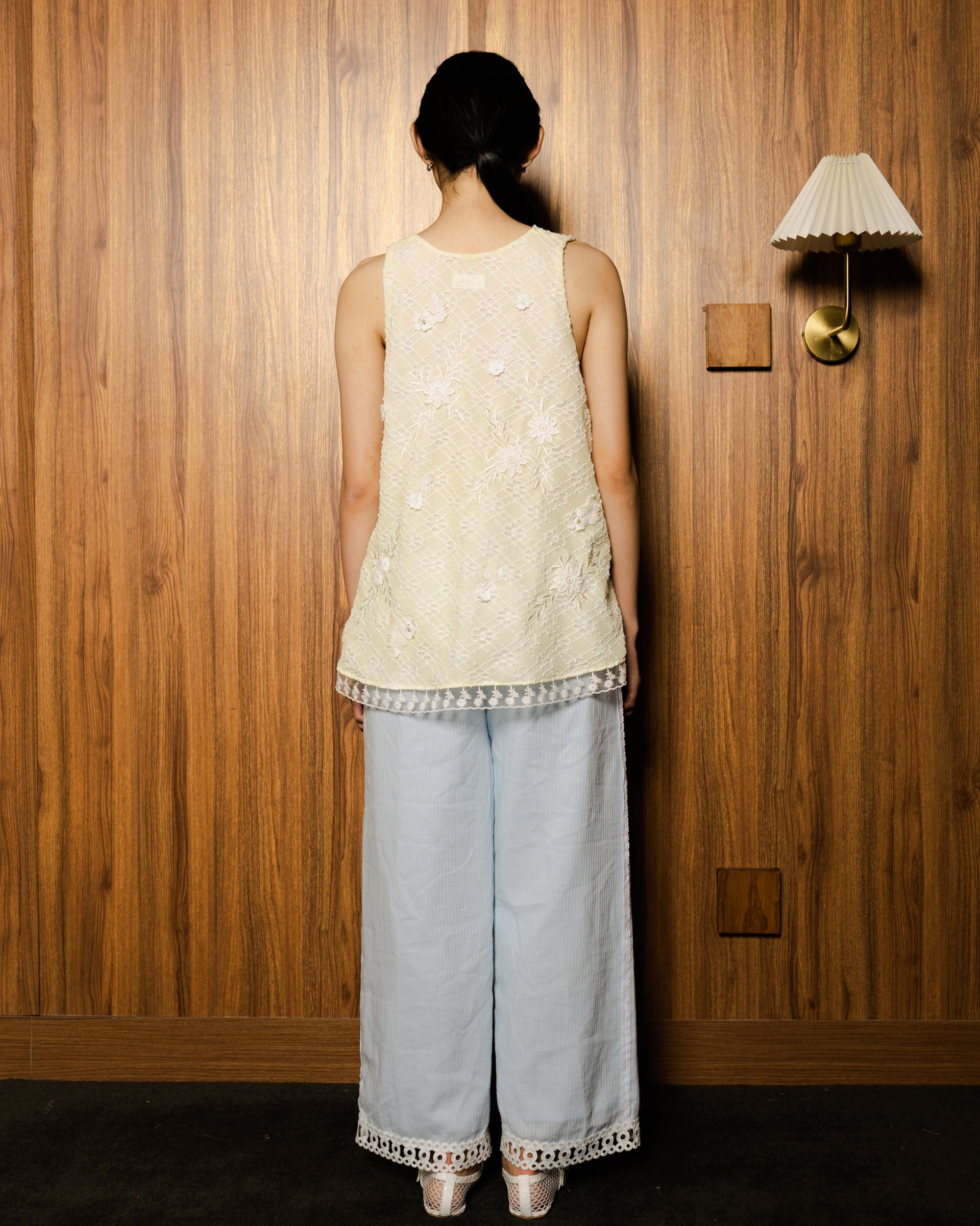 Image of Zhenna Sleeveless Top Yellow, a sleeveless top made from embroidered lace.